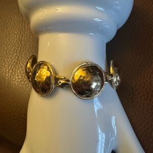 Gold tone hammered circular domed link bracelet